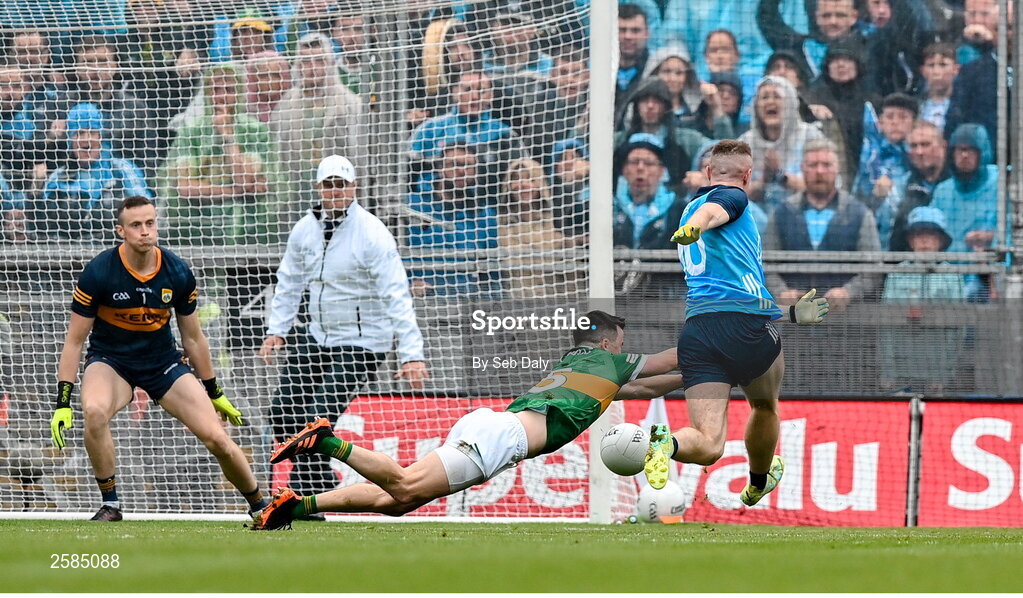 30 July 2023; Paddy Small of Dublin scores his side's first goal, despite pressure from Kerry's Paul Murphy , during the GAA Football All-Ireland Senior Championship final match between Dublin and Kerry at Croke Park in Dublin. Photo by Seb Daly/Sportsfile