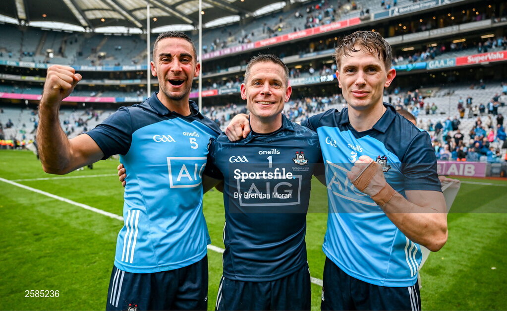 30 July 2023; Dublin nine time All Ireland medal winners from left, James McCarthy, Stephen Cluxton and Michael Fitzsimons celebrate after the GAA Football All-Ireland Senior Championship final match between Dublin and Kerry at Croke Park in Dublin. Photo by Brendan Moran/Sportsfile