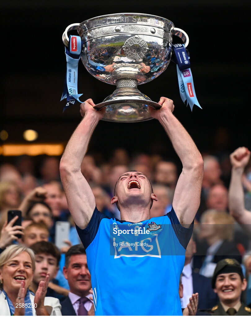 30 July 2023; Brian Fenton of Dublin lifts the Sam Maguire cup after the GAA Football All-Ireland Senior Championship final match between Dublin and Kerry at Croke Park in Dublin. Photo by Ramsey Cardy/Sportsfile