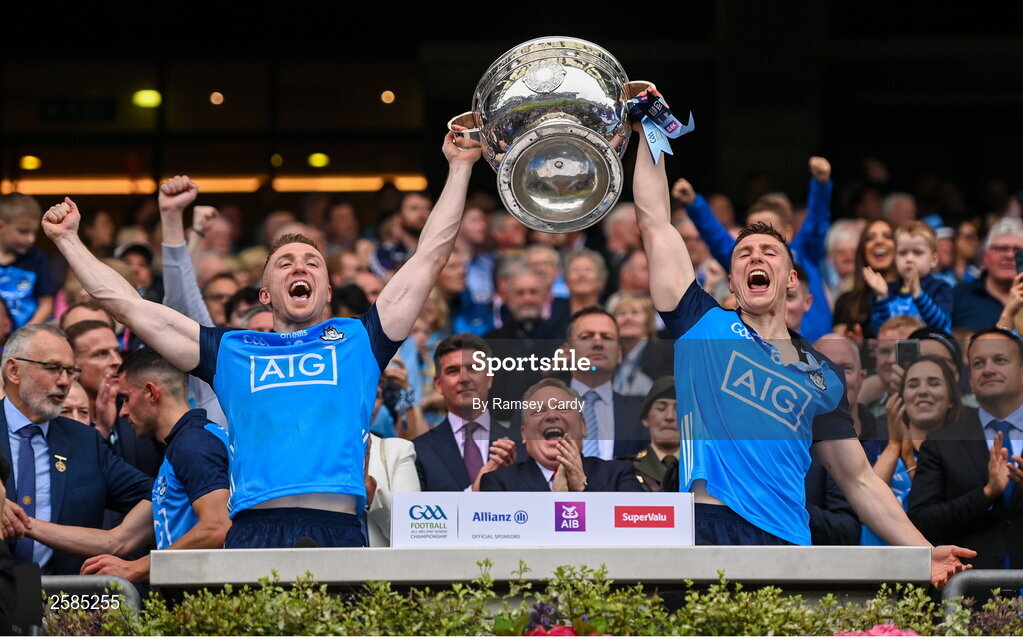 30 July 2023; Paddy Small, left, and John Small of Dublin lift the Sam Maguire cup after the GAA Football All-Ireland Senior Championship final match between Dublin and Kerry at Croke Park in Dublin. Photo by Ramsey Cardy/Sportsfile