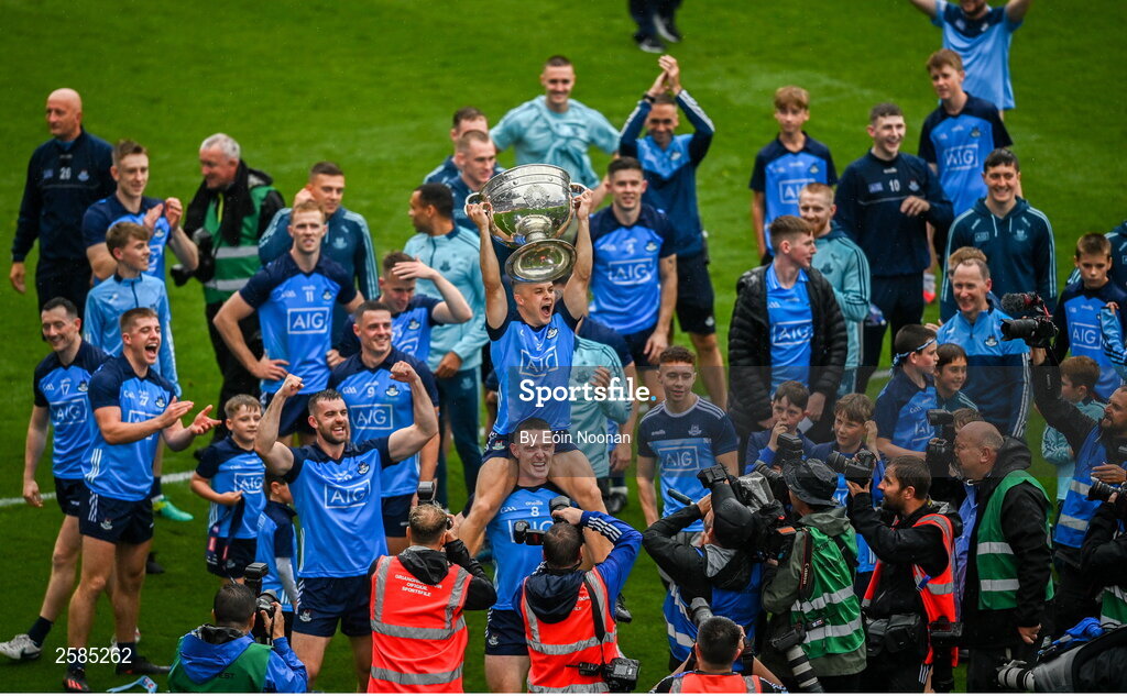 30 July 2023; Dublin players, Brian Fenton, bottom and Eoin Murchan celebrate with the Sam Maguire after the GAA Football All-Ireland Senior Championship final match between Dublin and Kerry at Croke Park in Dublin. Photo by Eóin Noonan/Sportsfile