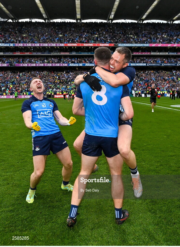 30 July 2023; Dublin players, from left, Paddy Small, Brian Fenton, 8, and Dean Rock celebrate after their side's victory in the GAA Football All-Ireland Senior Championship final match between Dublin and Kerry at Croke Park in Dublin. Photo by Seb Daly/Sportsfile