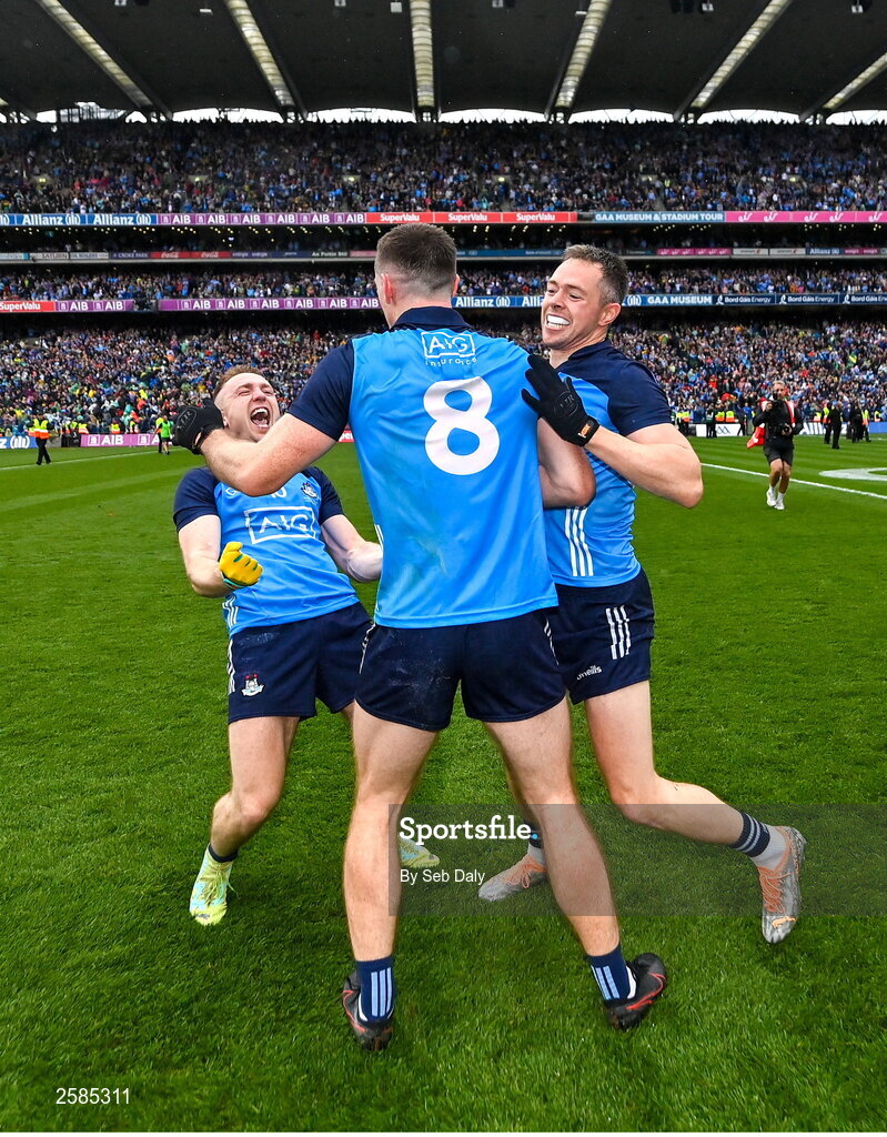 30 July 2023; Dublin players, from left, Paddy Small, Brian Fenton, 8, and Dean Rock celebrate after their side's victory in the GAA Football All-Ireland Senior Championship final match between Dublin and Kerry at Croke Park in Dublin. Photo by Seb Daly/Sportsfile