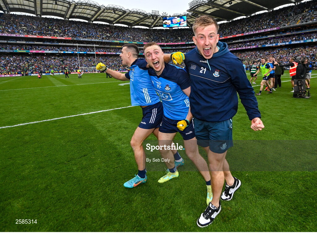 30 July 2023; Dublin players, from left, Cormac Costello, Paddy Small and Seán Bugler celebrate after their side's victory in the GAA Football All-Ireland Senior Championship final match between Dublin and Kerry at Croke Park in Dublin. Photo by Seb Daly/Sportsfile