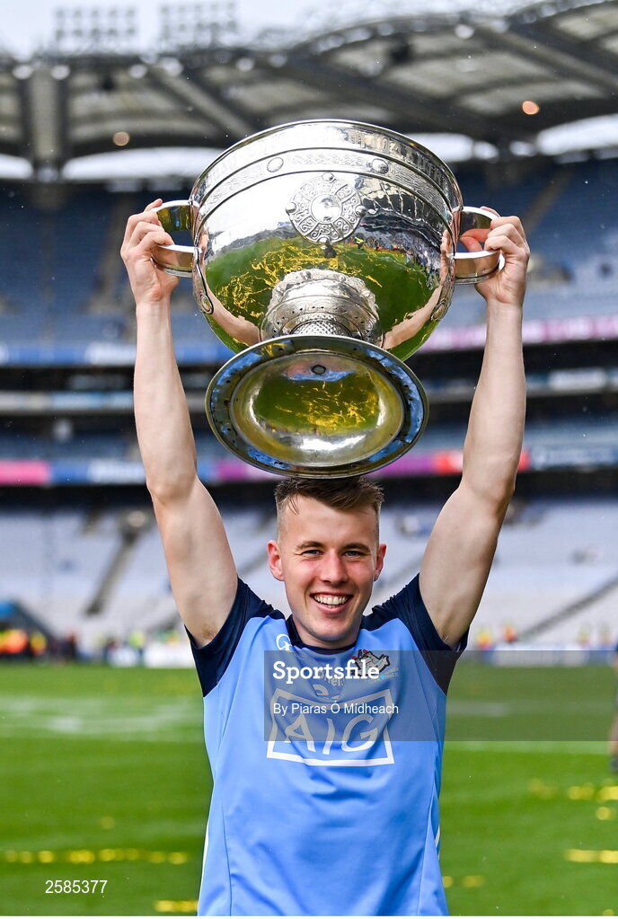 30 July 2023; Daire Newcombe of Dublin celebrates with the Sam Maguire Cup after his side's victory in the GAA Football All-Ireland Senior Championship final match between Dublin and Kerry at Croke Park in Dublin. Photo by Piaras Ó Mídheach/Sportsfile