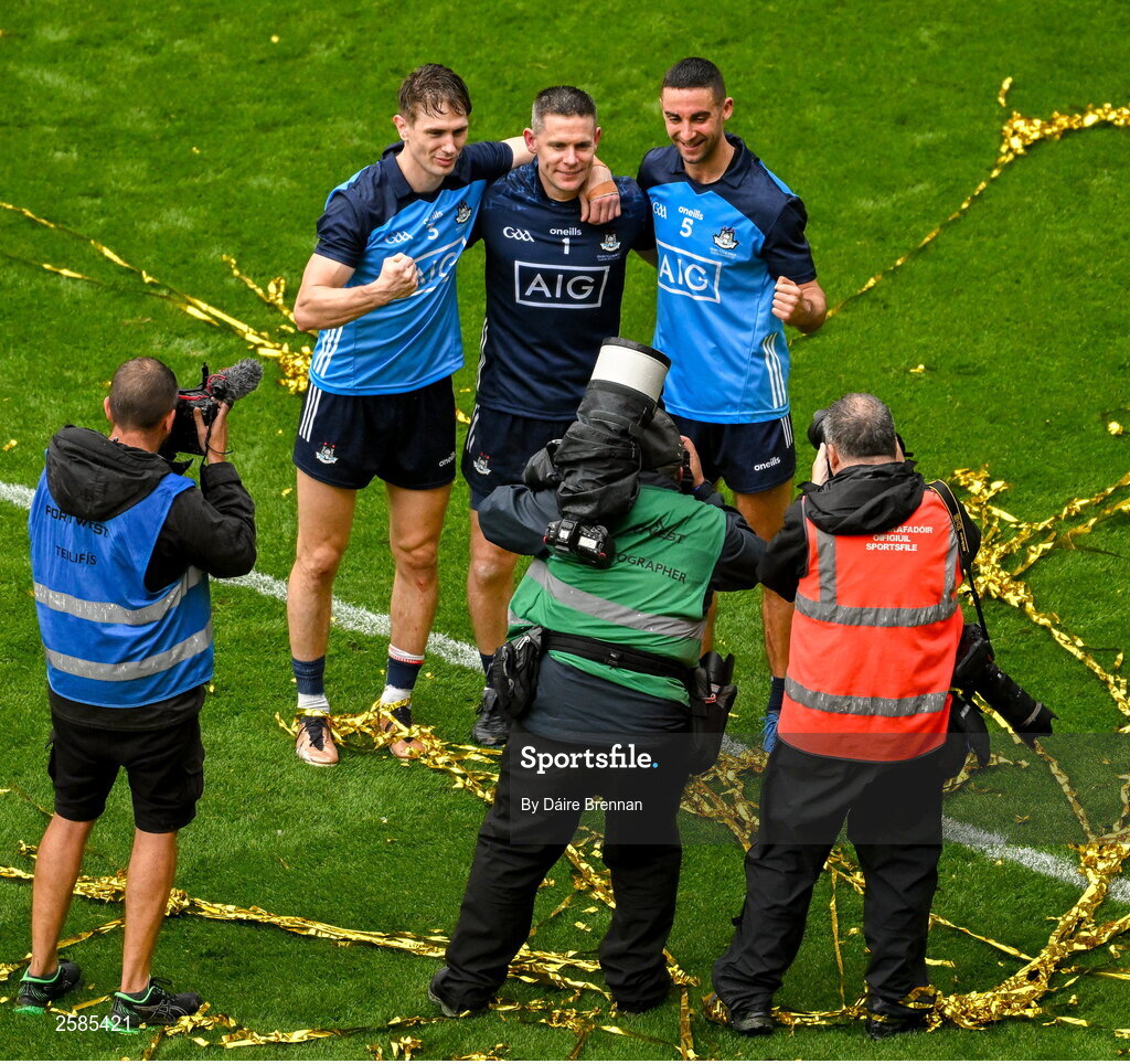 30 July 2023; Nine time All-Ireland winners, Michael Fitzsimons, left, Stephen Cluxton, and James McCarthy, celebrate after the GAA Football All-Ireland Senior Championship final match between Dublin and Kerry at Croke Park in Dublin. Photo by Daire Brennan/Sportsfile
