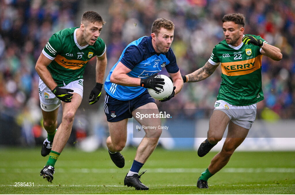 30 July 2023; Jack McCaffrey of Dublin in action against Adrian Spillane, left, and Micheál Burns of Kerry during the GAA Football All-Ireland Senior Championship final match between Dublin and Kerry at Croke Park in Dublin. Photo by Ramsey Cardy/Sportsfile