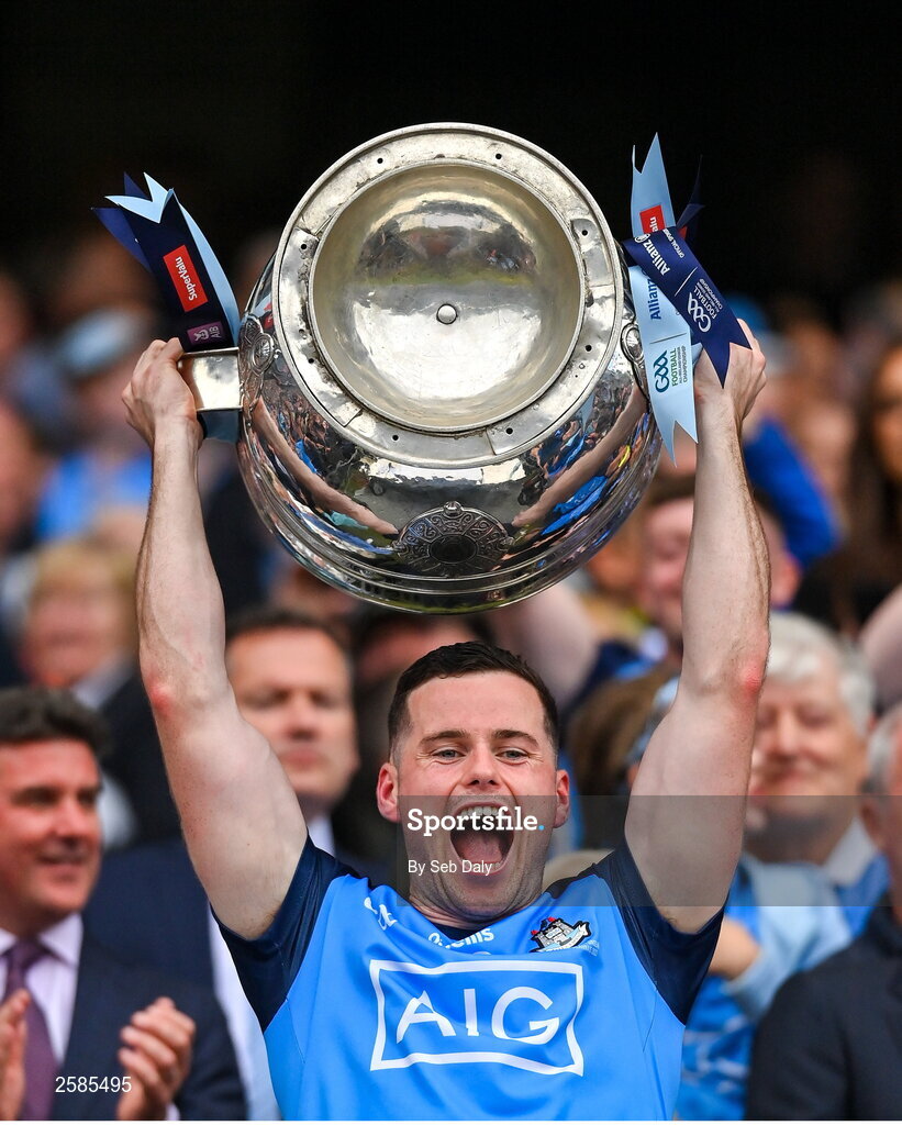 30 July 2023; Ross McGarry of Dublin lifts the Sam Maguire Cup after his side's victory in the GAA Football All-Ireland Senior Championship final match between Dublin and Kerry at Croke Park in Dublin. Photo by Seb Daly/Sportsfile