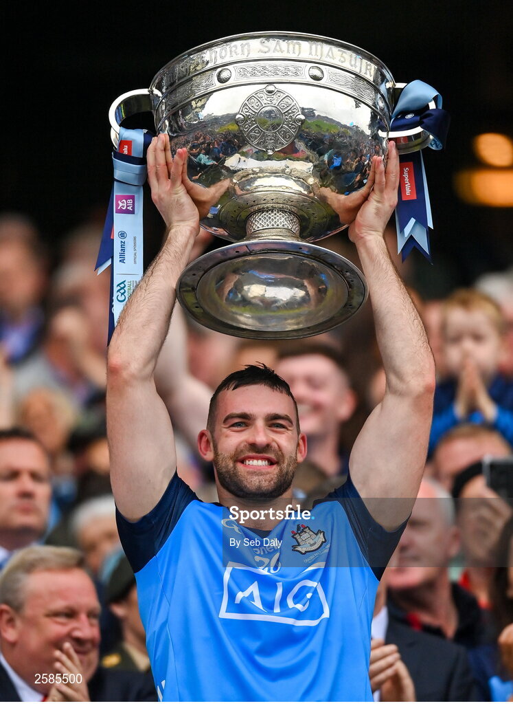 30 July 2023; Seán MacMahon of Dublin lifts the Sam Maguire Cup after his side's victory in the GAA Football All-Ireland Senior Championship final match between Dublin and Kerry at Croke Park in Dublin. Photo by Seb Daly/Sportsfile
