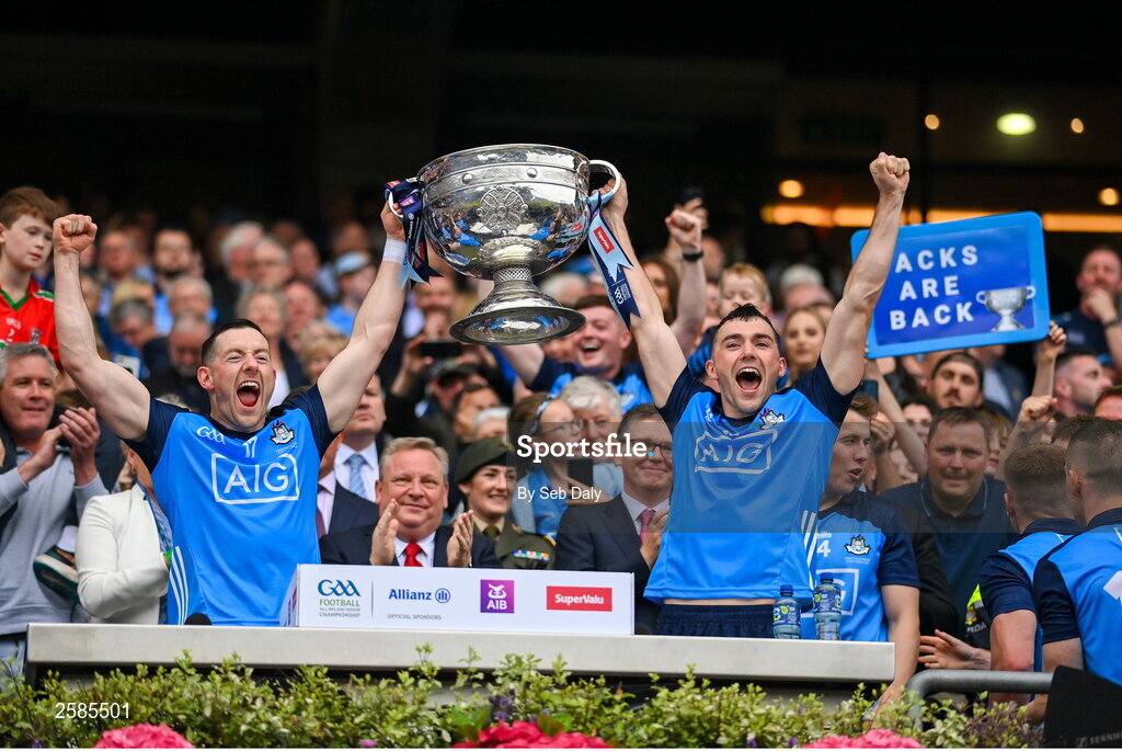 30 July 2023; Dublin players Ryan Basquel, left, and Colm Basquel lift the Sam Maguire Cup after their side's victory in the GAA Football All-Ireland Senior Championship final match between Dublin and Kerry at Croke Park in Dublin. Photo by Seb Daly/Sportsfile