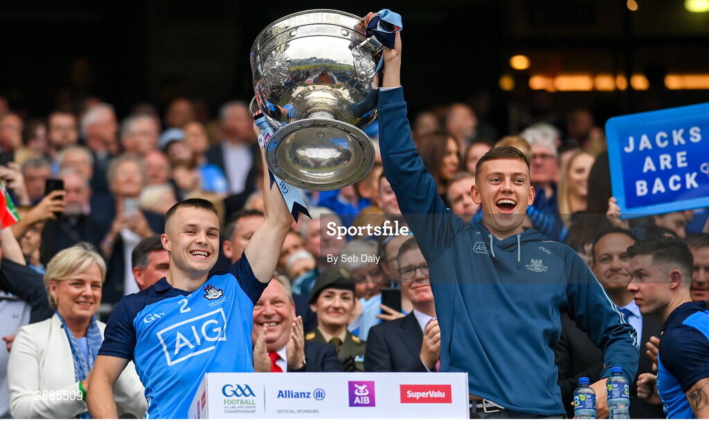 30 July 2023; Dublin players Eoin Murchan, left, and David O'Hanlon lift the Sam Maguire Cup after their side's victory in the GAA Football All-Ireland Senior Championship final match between Dublin and Kerry at Croke Park in Dublin. Photo by Seb Daly/Sportsfile