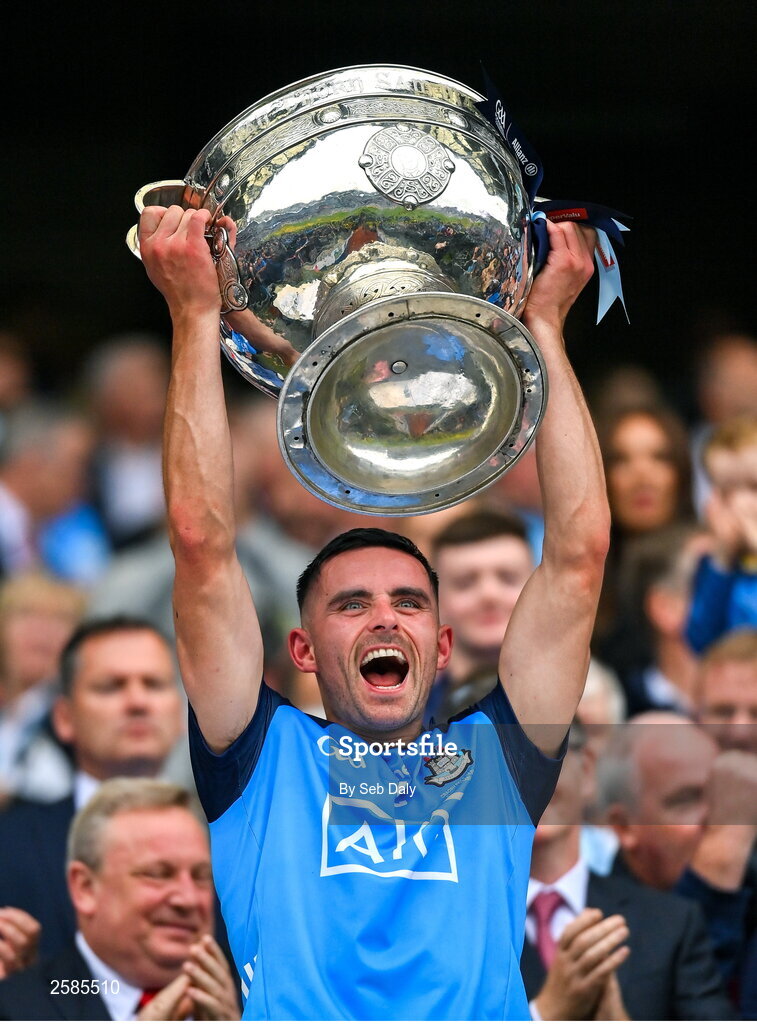 30 July 2023; Niall Scully of Dublin lifts the Sam Maguire Cup after his side's victory in the GAA Football All-Ireland Senior Championship final match between Dublin and Kerry at Croke Park in Dublin. Photo by Seb Daly/Sportsfile