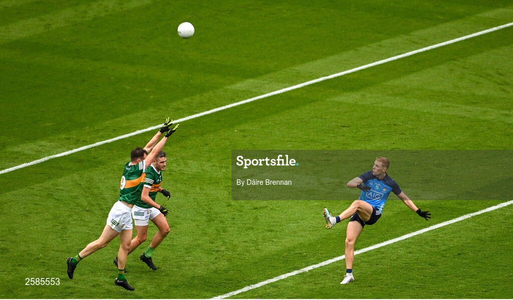 30 July 2023; Paul Mannion of Dublin gets a shot away despite the challenge of Jack Barry of Kerry during the GAA Football All-Ireland Senior Championship final match between Dublin and Kerry at Croke Park in Dublin. Photo by Daire Brennan/Sportsfile