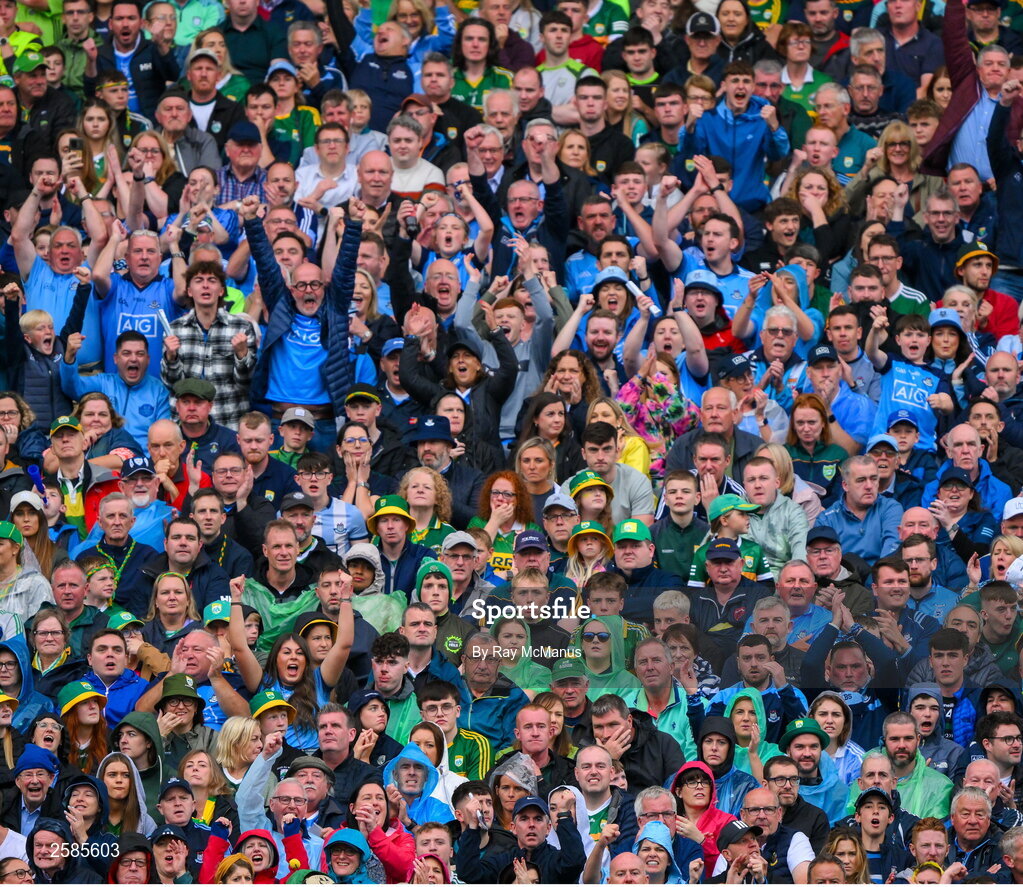 30 July 2023; Dublin supporters, in the Hogan Stand, celebrate a score during the GAA Football All-Ireland Senior Championship final match between Dublin and Kerry at Croke Park in Dublin. Photo by Ray McManus/Sportsfile
