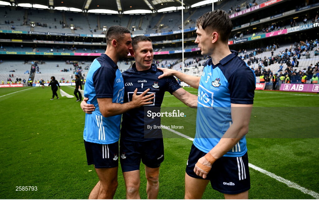 30 July 2023; Dublin players and record 9 time All-Ireland winning medallists, from left, captain James McCarthy, Stephen Cluxton and Michael Fitzsimons celebrate after the GAA Football All-Ireland Senior Championship final match between Dublin and Kerry at Croke Park in Dublin. Photo by Brendan Moran/Sportsfile