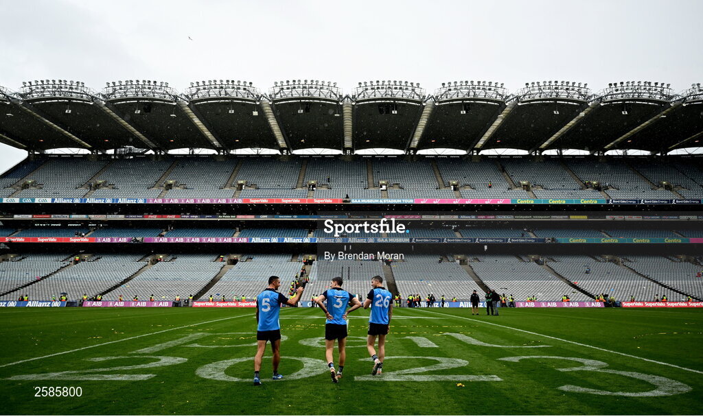 30 July 2023; Dublin players, from left, James McCarthy, Michael Fitzsimons and Dean Rock walk out to the middle of the pitch following the celebrations after their victory in the GAA Football All-Ireland Senior Championship final match between Dublin and Kerry at Croke Park in Dublin. Photo by Brendan Moran/Sportsfile