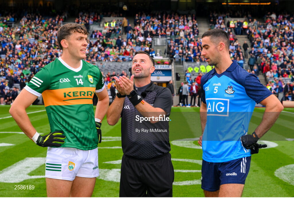 30 July 2023; Referee David Gough tosses a coin between the Kerry and Dublin captains, David Clifford and James McCarthy, ahead of the GAA Football All-Ireland Senior Championship final match between Dublin and Kerry at Croke Park in Dublin. Photo by Ray McManus/Sportsfile