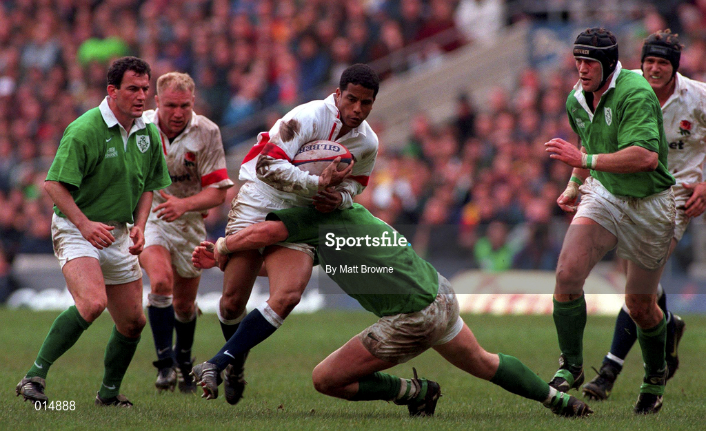 4 April 1998; Jeremy Guscott of England is tackled by Reggie Corrigan of Ireland during the Five Nations Rugby Championship match between England and Ireland at Twickenham Stadium in London, England. Photo by Matt Browne/Sportsfile