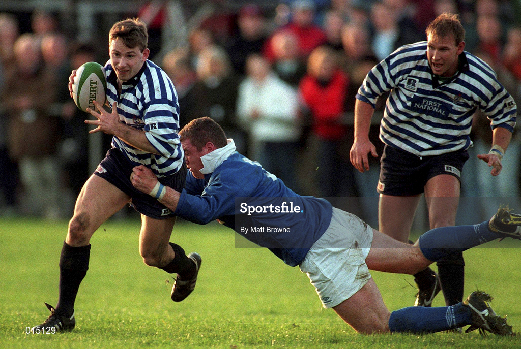 22 November 1997; Alan McGowan of Blackrock College is tackled by Victor Costello of St Mary's College during the All-Ireland League Division 1 match between St Mary's College RFC and Blackrock College RFC at Templeville Road in Dublin. Photo by Matt Browne/Sportsfile