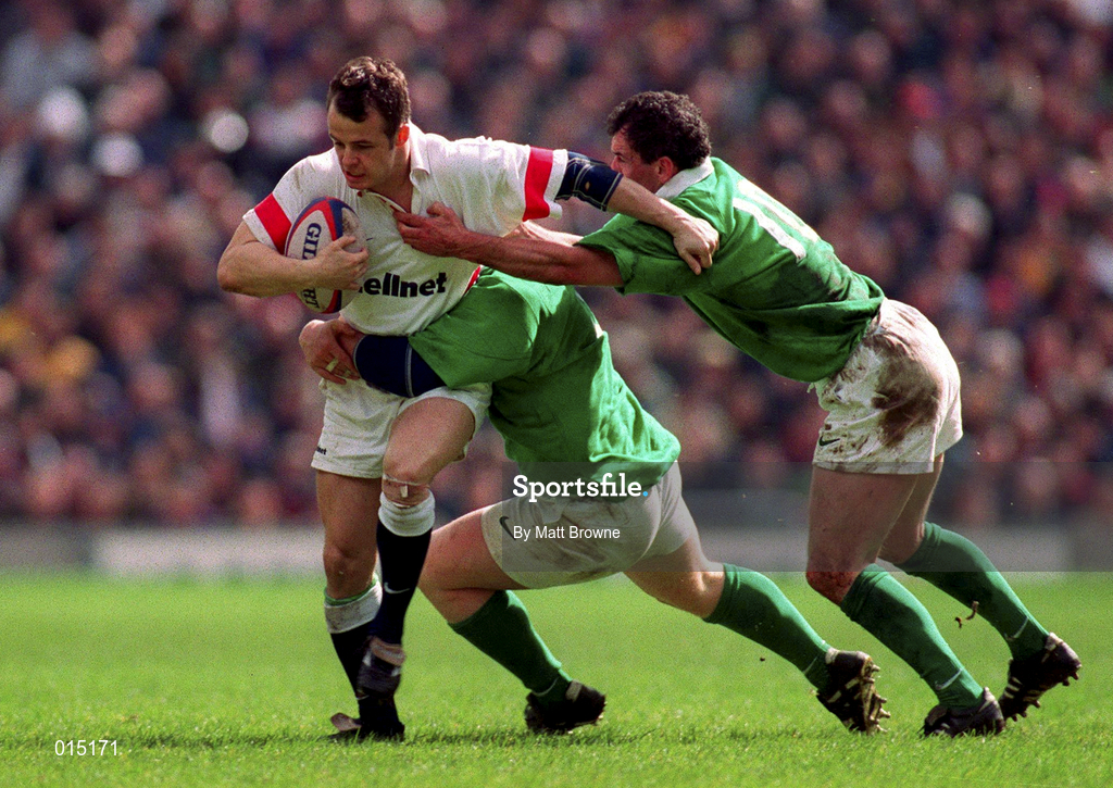 4 April 1998; Austin Healey of England is tackled by Paul Wallace and Eric Elwood of Ireland during the Five Nations Rugby Championship match between England and Ireland at Twickenham Stadium in London, England. Photo by Matt Browne/Sportsfile