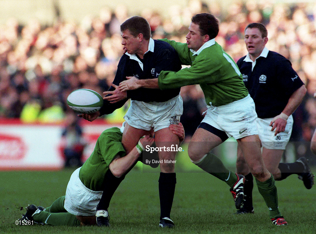 7 February 1998; Craig Chalmers of Scotland is tackled by Mark McCall, left, and David Humphreys of Ireland during the Five Nations Rugby Championship match between Ireland and Scotland at Lansdowne Road in Dublin, Ireland. Photo by David Maher/Sportsfile