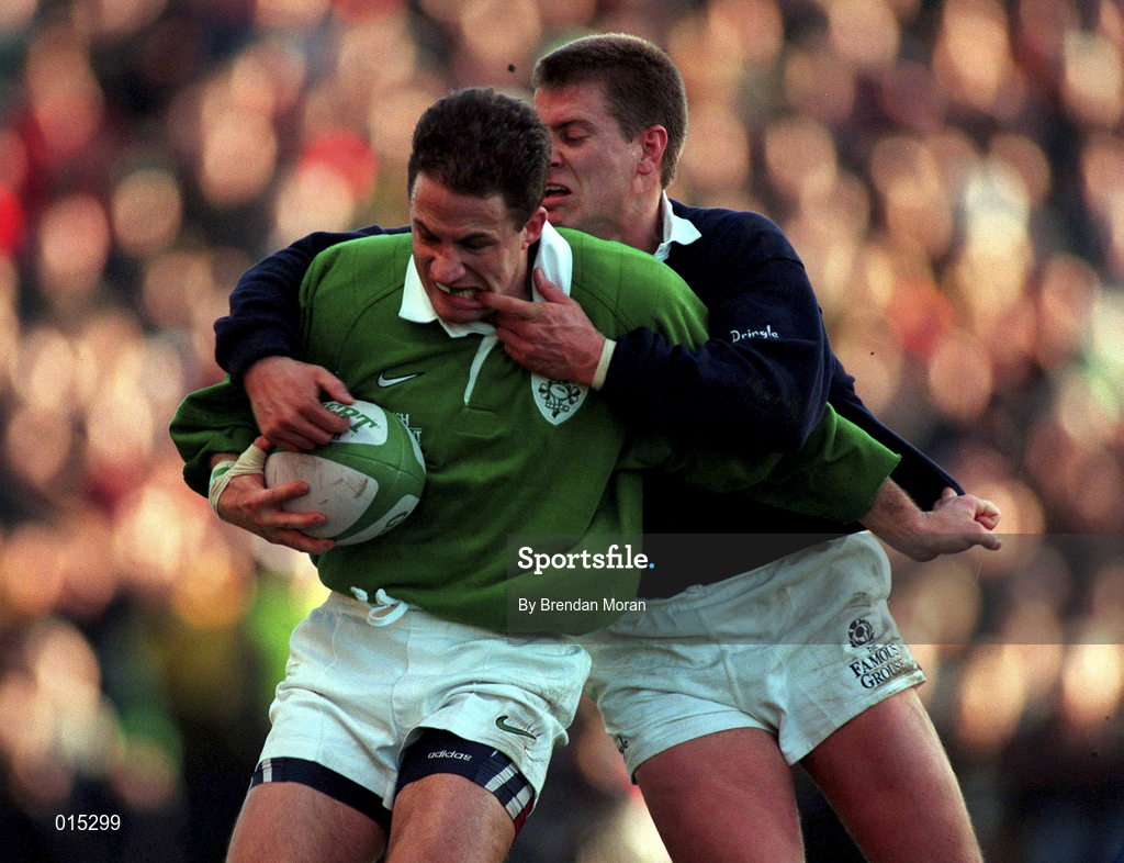 7 February 1998; David Humphreys of Ireland is tackled by Craig Chalmers of Scotland during the Five Nations Rugby Championship match between Ireland and Scotland at Lansdowne Road in Dublin, Ireland. Photo by Brendan Moran/Sportsfile