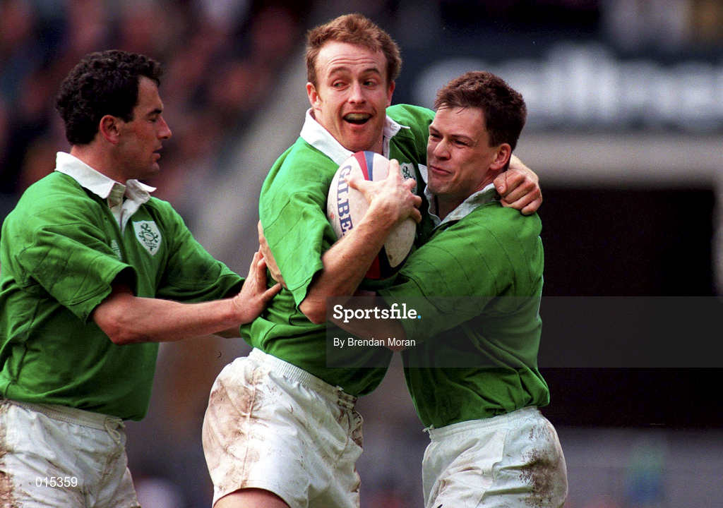 4 April 1998; Denis Hickie of Ireland celebrates with team-mates Eric Elwood, left, and Richard Wallace, right, after scoring their side's second try during the Five Nations Rugby Championship match between England and Ireland at Twickenham Stadium in London, England. Photo by Brendan Moran/Sportsfile