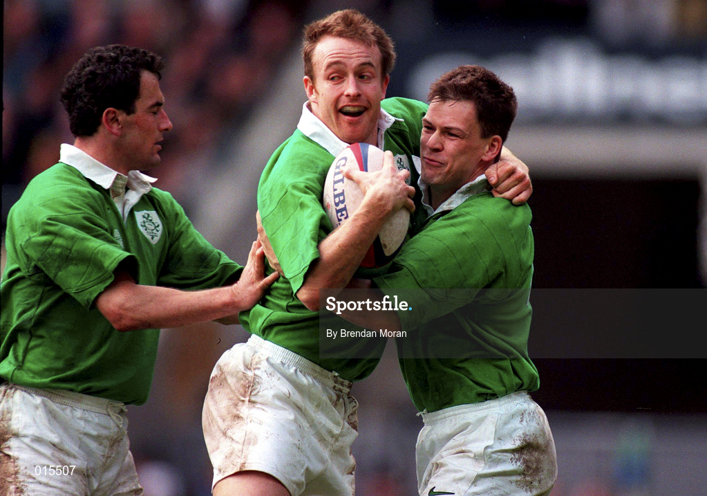 4 April 1998; Denis Hickie of Ireland celebrates with team-mates Eric Elwood, left, and Richard Wallace, right, after scoring their side's second try during the Five Nations Rugby Championship match between England and Ireland at Twickenham Stadium in London, England. Photo by Brendan Moran/Sportsfile