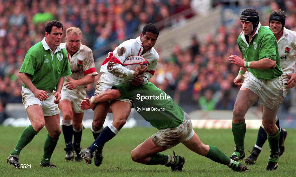 4 April 1998; Jeremy Guscott of England is tackled by Reggie Corrigan of Ireland during the Five Nations Rugby Championship match between England and Ireland at Twickenham Stadium in London, England. Photo by Matt Browne/Sportsfile