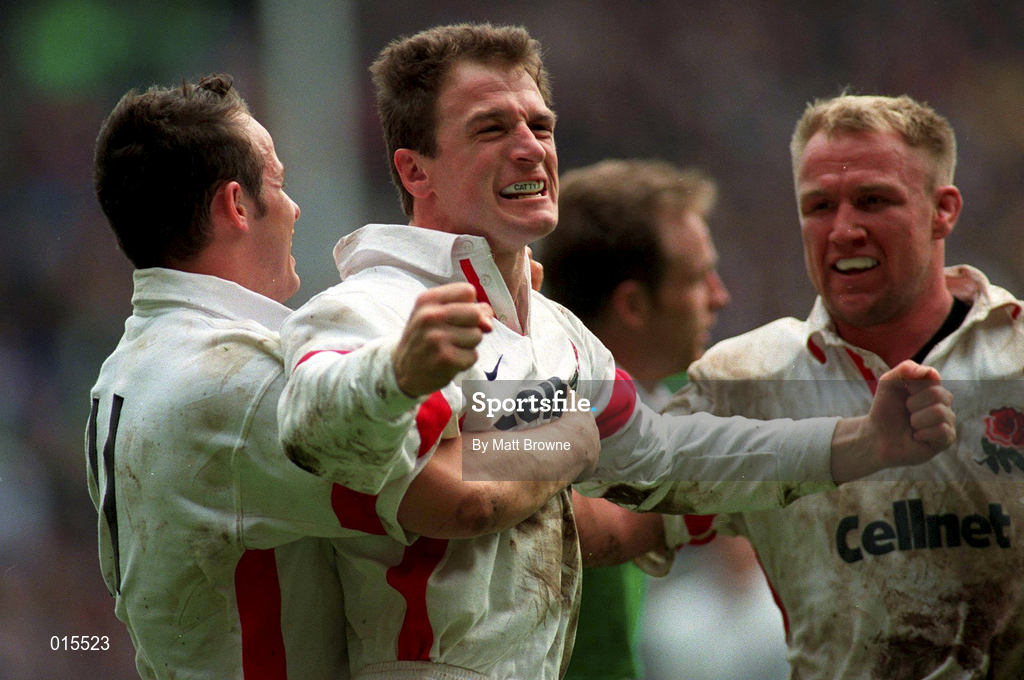 4 April 1998; Mike Catt of England celebrates with team-mates Austin Healey, left, and Neil Back after scoring a try during the Five Nations Rugby Championship match between England and Ireland at Twickenham Stadium in London, England. Photo by Matt Browne/Sportsfile