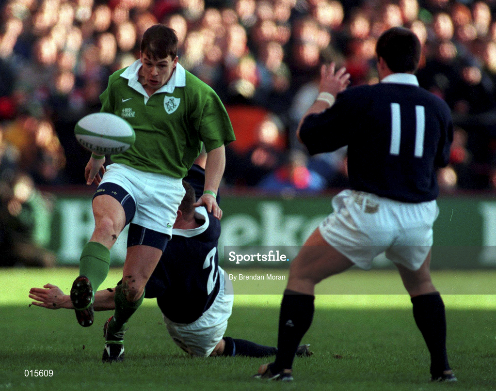 7 February 1998; Richard Wallace of Ireland chips through Kenny Logan of Scotland during the Five Nations Rugby Championship match between Ireland and Scotland at Lansdowne Road in Dublin, Ireland. Photo by Brendan Moran/Sportsfile