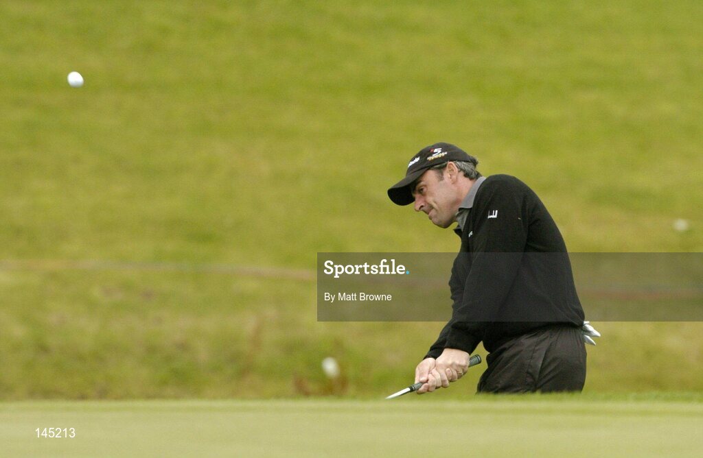 2 July 2004; Paul McGinley pitches onto the 18th green during the Smurfit European Open. South Course, K Club, Straffan, Co. Kildare, Ireland. Picture credit; Matt Browne / SPORTSFILE