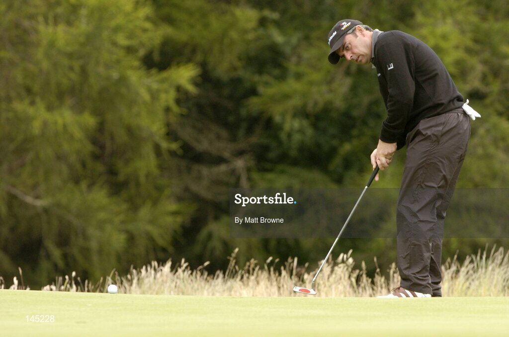 2 July 2004; Paul McGinley watches his putt on the 8th green during the Smurfit European Open. South Course, K Club, Straffan, Co. Kildare, Ireland. Picture credit; Matt Browne / SPORTSFILE