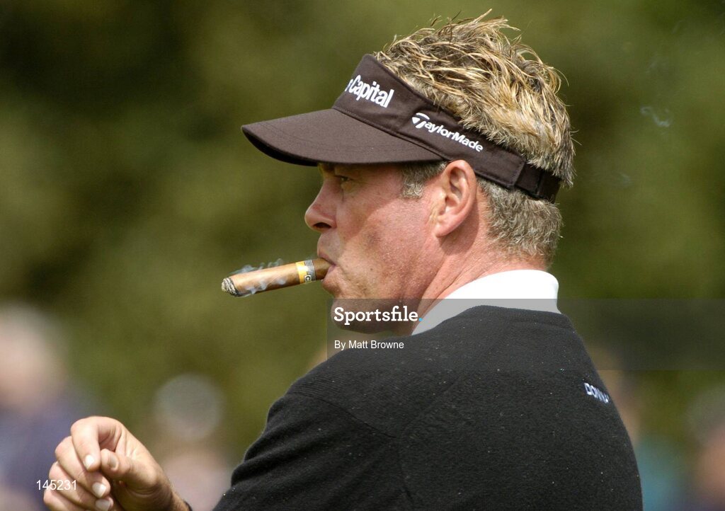 2 July 2004; Darren Clarke smokes a cigar during the Smurfit European Open. South Course, K Club, Straffan, Co. Kildare, Ireland. Picture credit; Matt Browne / SPORTSFILE