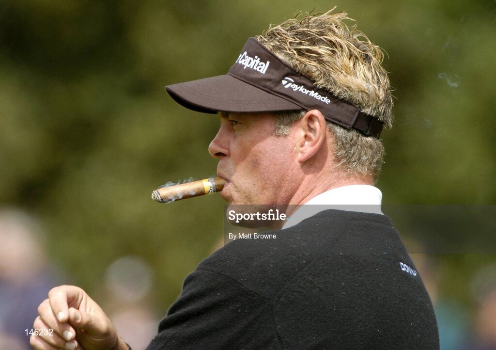 2 July 2004; Darren Clarke smokes a cigar during the Smurfit European Open. South Course, K Club, Straffan, Co. Kildare, Ireland. Picture credit; Matt Browne / SPORTSFILE
