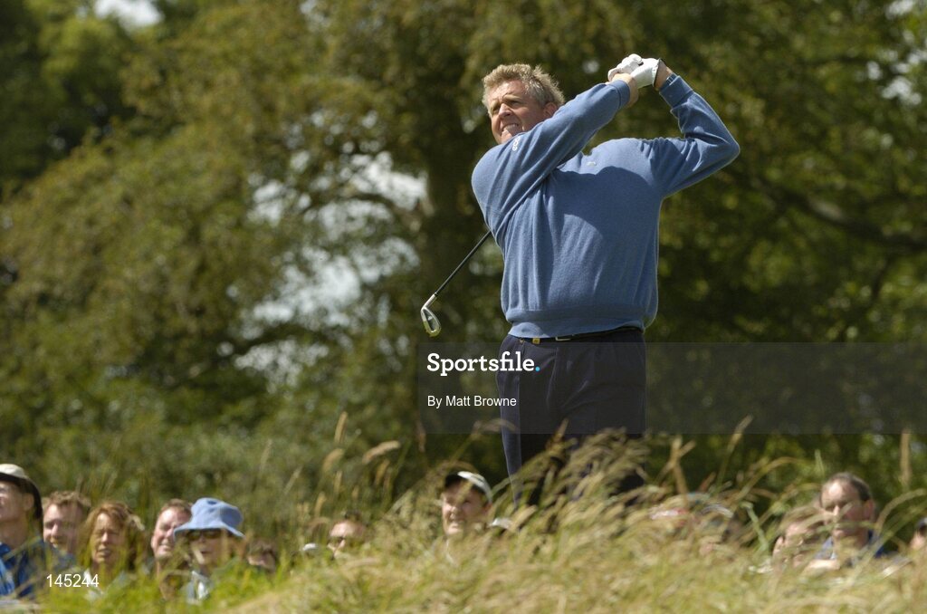 2 July 2004; Colin Montgomerie watches his tee shot from the 8th tee box during the Smurfit European Open. South Course, K Club, Straffan, Co. Kildare, Ireland. Picture credit; Matt Browne / SPORTSFILE