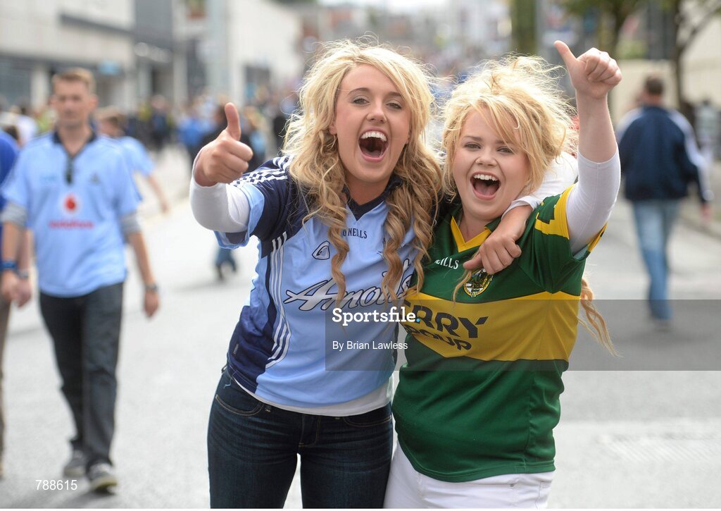 1 September 2013; GAA supporters Sylvaine Egan, from Beaumount, Dublin, and Marianne O'Brien, from Tralee, Co. Kerry, on their way to the game. GAA Football All-Ireland Senior Championship, Semi-Final, Dublin v Kerry, Croke Park, Dublin. Picture credit: Brian Lawless / SPORTSFILE