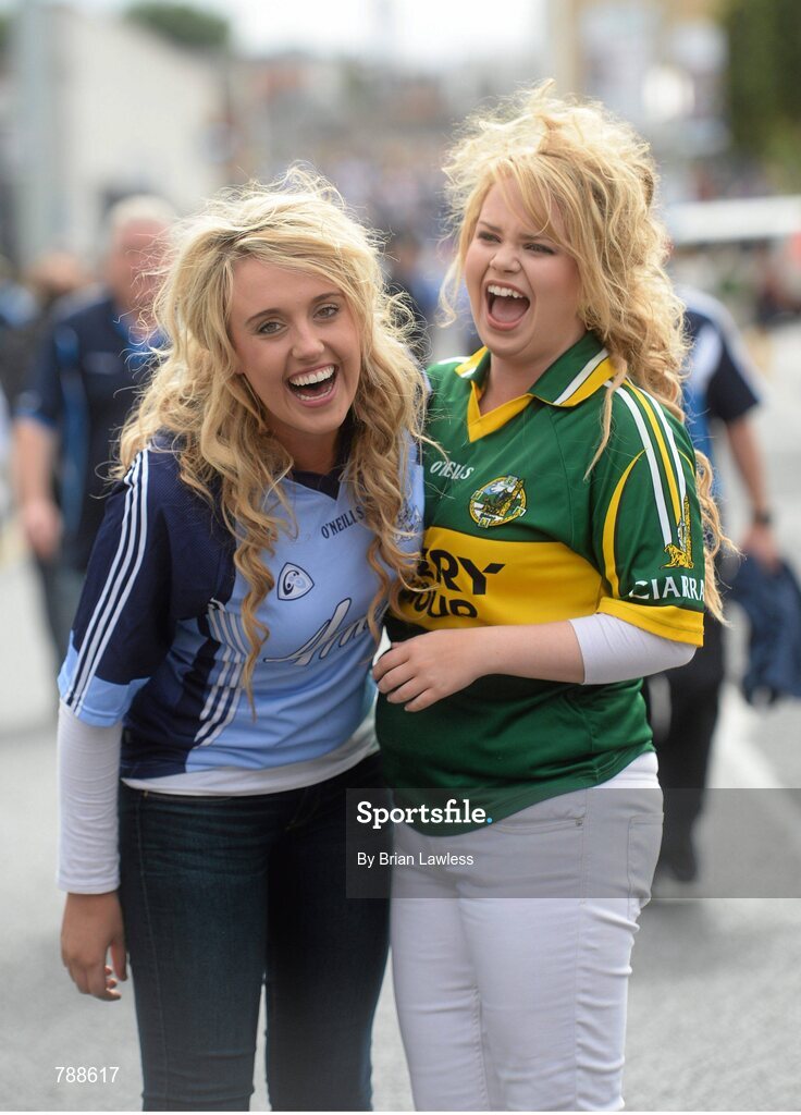 1 September 2013; GAA supporters Sylvaine Egan, from Beaumount, Dublin, and Marianne O'Brien, from Tralee, Co. Kerry, on their way to the game. GAA Football All-Ireland Senior Championship, Semi-Final, Dublin v Kerry, Croke Park, Dublin. Picture credit: Brian Lawless / SPORTSFILE