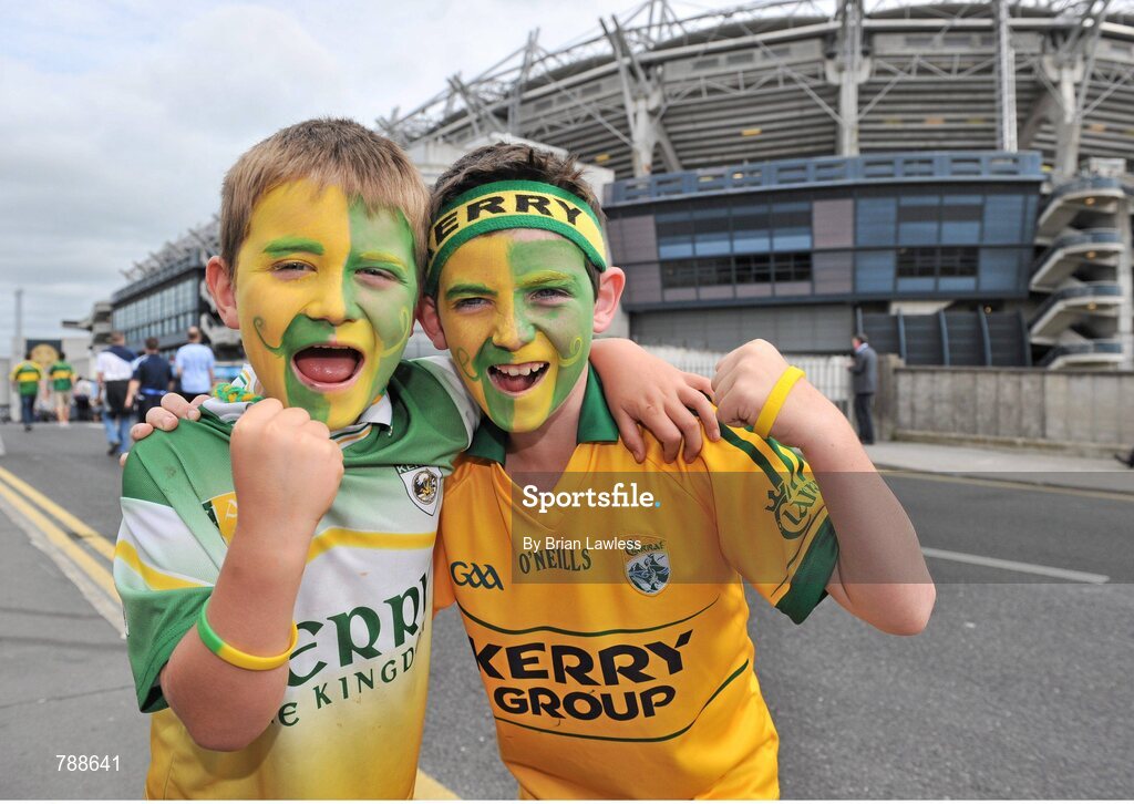 1 September 2013; Kerry supporters Jason Ahern, age 7, from Ballylongford, Co. Kerry, left, and Christopher Mulvihill, age 9, originally from Ballylongford, Co. Kerry, but now living in New York, U.S.A., on their way to the match. GAA Football All-Ireland Senior Championship, Semi-Final, Dublin v Kerry, Croke Park, Dublin. Picture credit: Brian Lawless / SPORTSFILE