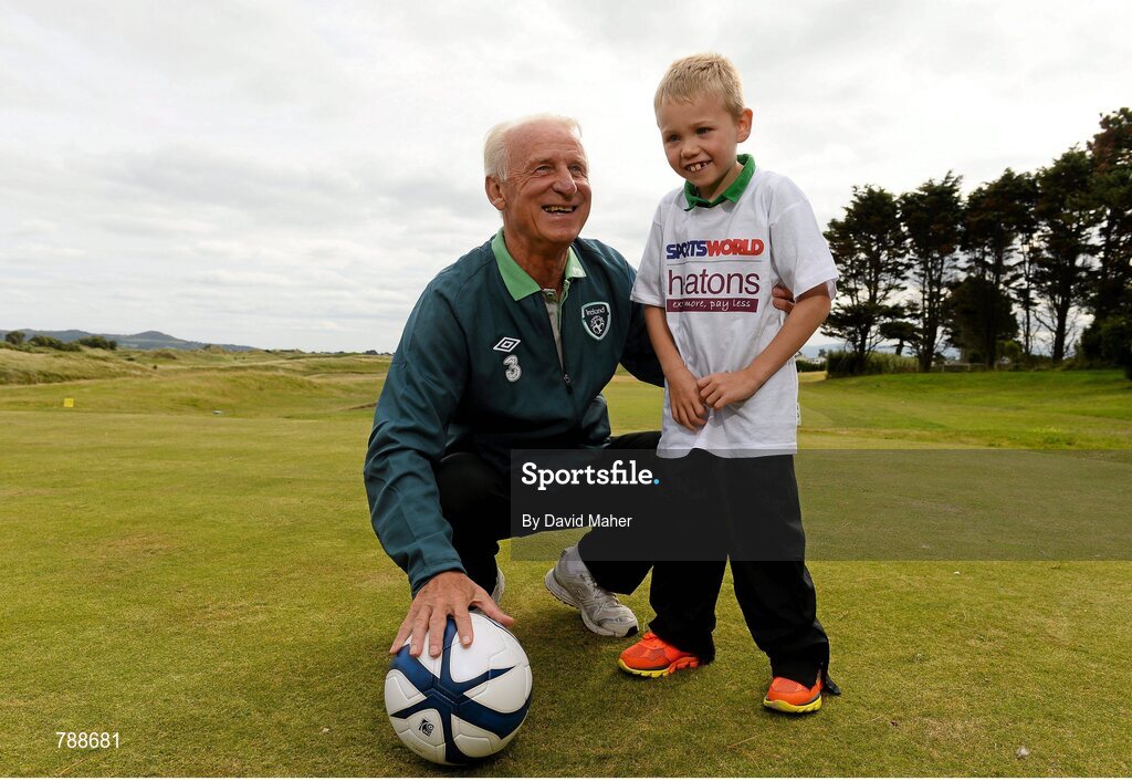1 September 2013; Republic of Ireland manager Giovanni Trapattoni with 7 year old James Casserly, from Dublin, in attendance at the Heatons / Sportsworld ‘Football in the Community’ partnership launch. Portmarnock Hotel and Golf Links, Portmarnock, Co. Dublin. Picture credit: David Maher / SPORTSFILE