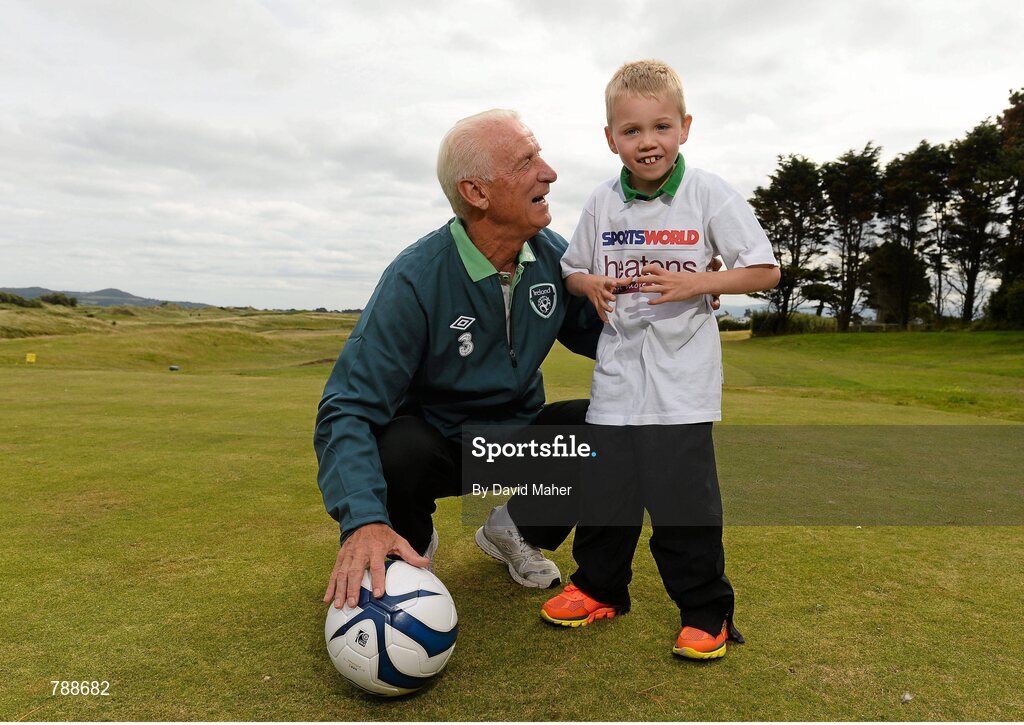 1 September 2013; Republic of Ireland manager Giovanni Trapattoni with 7 year old James Casserly, from Dublin, in attendance at the Heatons / Sportsworld ‘Football in the Community’ partnership launch. Portmarnock Hotel and Golf Links, Portmarnock, Co. Dublin. Picture credit: David Maher / SPORTSFILE