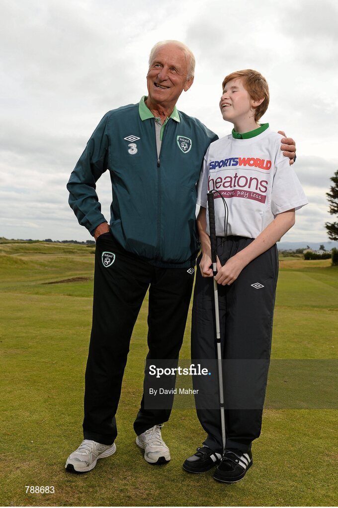 1 September 2013; Republic of Ireland manager Giovanni Trapattoni with 11 year old Josh Kelly, from Dublin, in attendance at the Heatons / Sportsworld ‘Football in the Community’ partnership launch. Portmarnock Hotel and Golf Links, Portmarnock, Co. Dublin. Picture credit: David Maher / SPORTSFILE