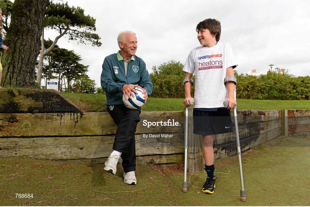 1 September 2013; Republic of Ireland manager Giovanni Trapattoni with 12 year old Neil Hoey, from Dublin, in attendance at the Heatons / Sportsworld ‘Football in the Community’ partnership launch. Portmarnock Hotel and Golf Links, Portmarnock, Co. Dublin. Picture credit: David Maher / SPORTSFILE