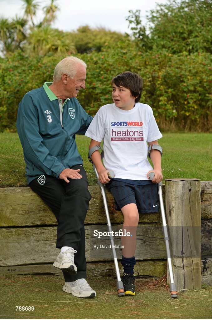 1 September 2013; Republic of Ireland manager Giovanni Trapattoni with 12 year old Neil Hoey, from Dublin, in attendance at the Heatons / Sportsworld ‘Football in the Community’ partnership launch. Portmarnock Hotel and Golf Links, Portmarnock, Co. Dublin. Picture credit: David Maher / SPORTSFILE