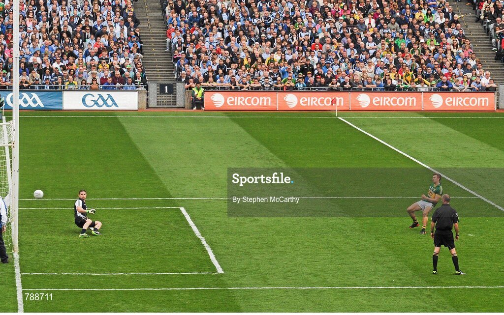 1 September 2013; James O'Donoghue, Kerry, shoots to score his side's third goal, from a penalty, past Dublin goalkeeper Stephen Cluxton. GAA Football All-Ireland Senior Championship, Semi-Final, Dublin v Kerry, Croke Park, Dublin. Picture credit: Stephen McCarthy / SPORTSFILE