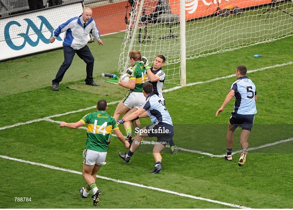 1 September 2013; Stephen Cluxton, Dublin, fouls Donnchadh Walsh, Kerry, which resulted in a penalty for Kerry. GAA Football All-Ireland Senior Championship, Semi-Final, Dublin v Kerry, Croke Park, Dublin. Picture credit: Dáire Brennan / SPORTSFILE