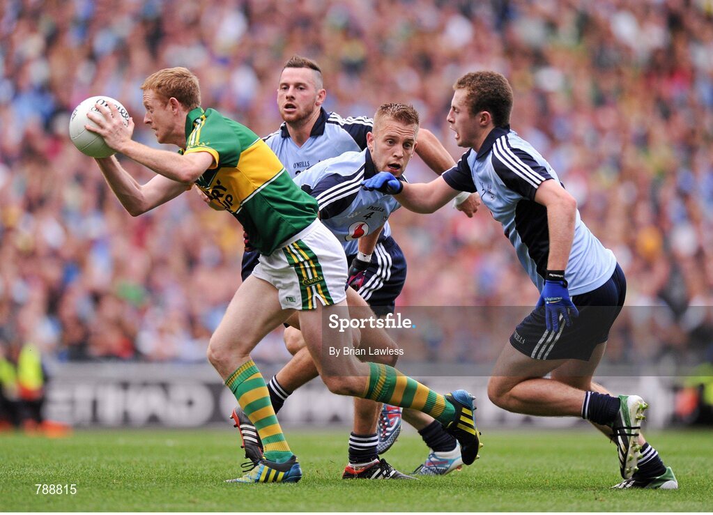 1 September 2013; Colm Cooper, Kerry, in action against, from left, Philip McMahon, Jonny Cooper, and Jack McCaffrey, Dublin. GAA Football All-Ireland Senior Championship, Semi-Final, Dublin v Kerry, Croke Park, Dublin. Picture credit: Brian Lawless / SPORTSFILE