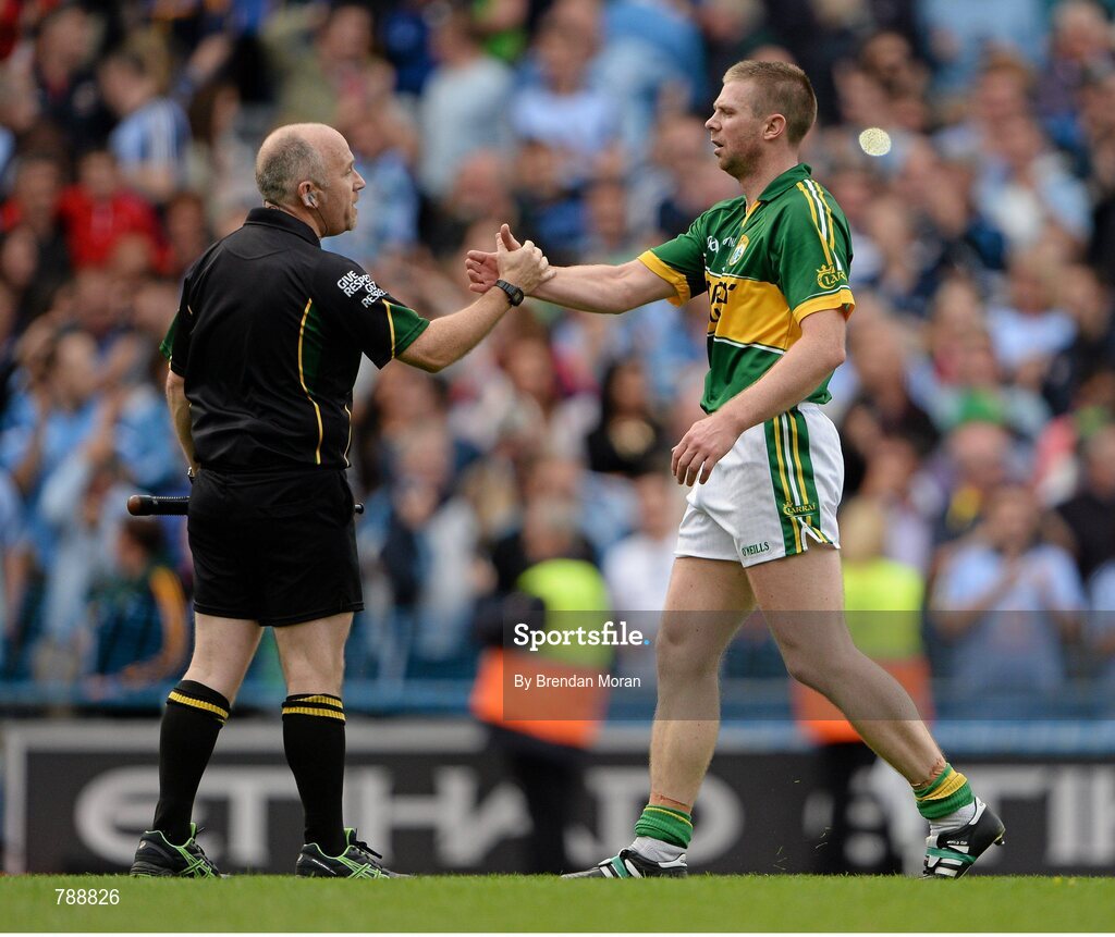 1 September 2013; Tomás O Sé, Kerry, shakes hands with linesman Marty Duffy after the final whistle. GAA Football All-Ireland Senior Championship, Semi-Final, Dublin v Kerry, Croke Park, Dublin. Picture credit: Brendan Moran / SPORTSFILE