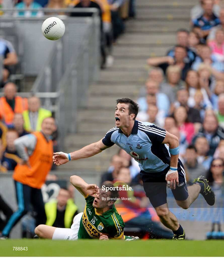 1 September 2013; Michael Darragh MacAuley, Dublin, wins the breaking ball ahead of David Moran, Kerry, which was picked up by Kevin McManamon and led to him scoring Dublin's second goal of the game. GAA Football All-Ireland Senior Championship, Semi-Final, Dublin v Kerry, Croke Park, Dublin. Picture credit: Brendan Moran / SPORTSFILE