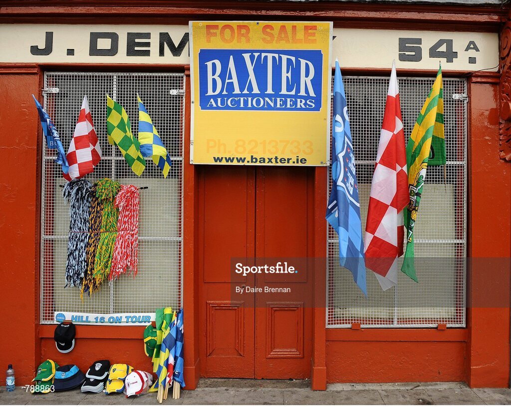 1 September 2013; Flags hang from a vacant shop on Dorset Street. GAA Football All-Ireland Senior Championship, Semi-Final, Dublin v Kerry, Croke Park, Dublin. Picture credit: Dáire Brennan / SPORTSFILE